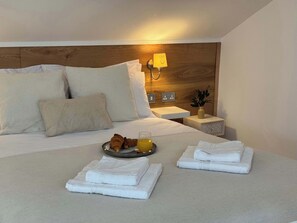 4 habitaciones, tabla de planchar con plancha, internet y ropa de cama 