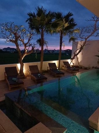 Outdoor pool. The KD Suites & Coffee Shop