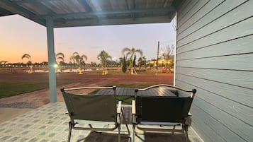 Villa | Living area | 32-inch TV with cable channels