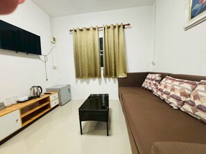 Biệt thự | Khu phòng khách | TV 32-inch có truyền hình cáp 