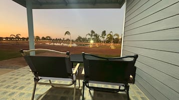 Standard Villa | Living area | 32-inch TV with cable channels