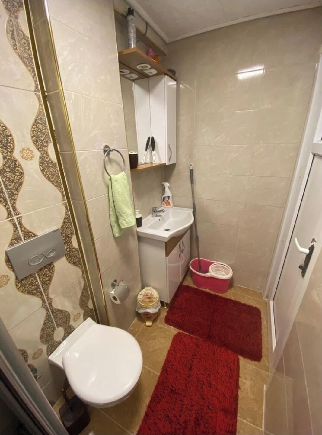 Shower, hair dryer, towels, toilet paper