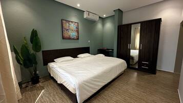 Bungalow, Lanai, Sea View | In-room safe, desk, blackout drapes, iron/ironing board