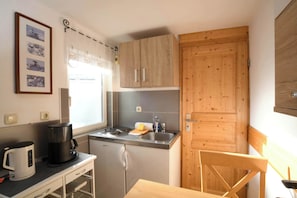 Fridge, coffee/tea maker, electric kettle, high chair
