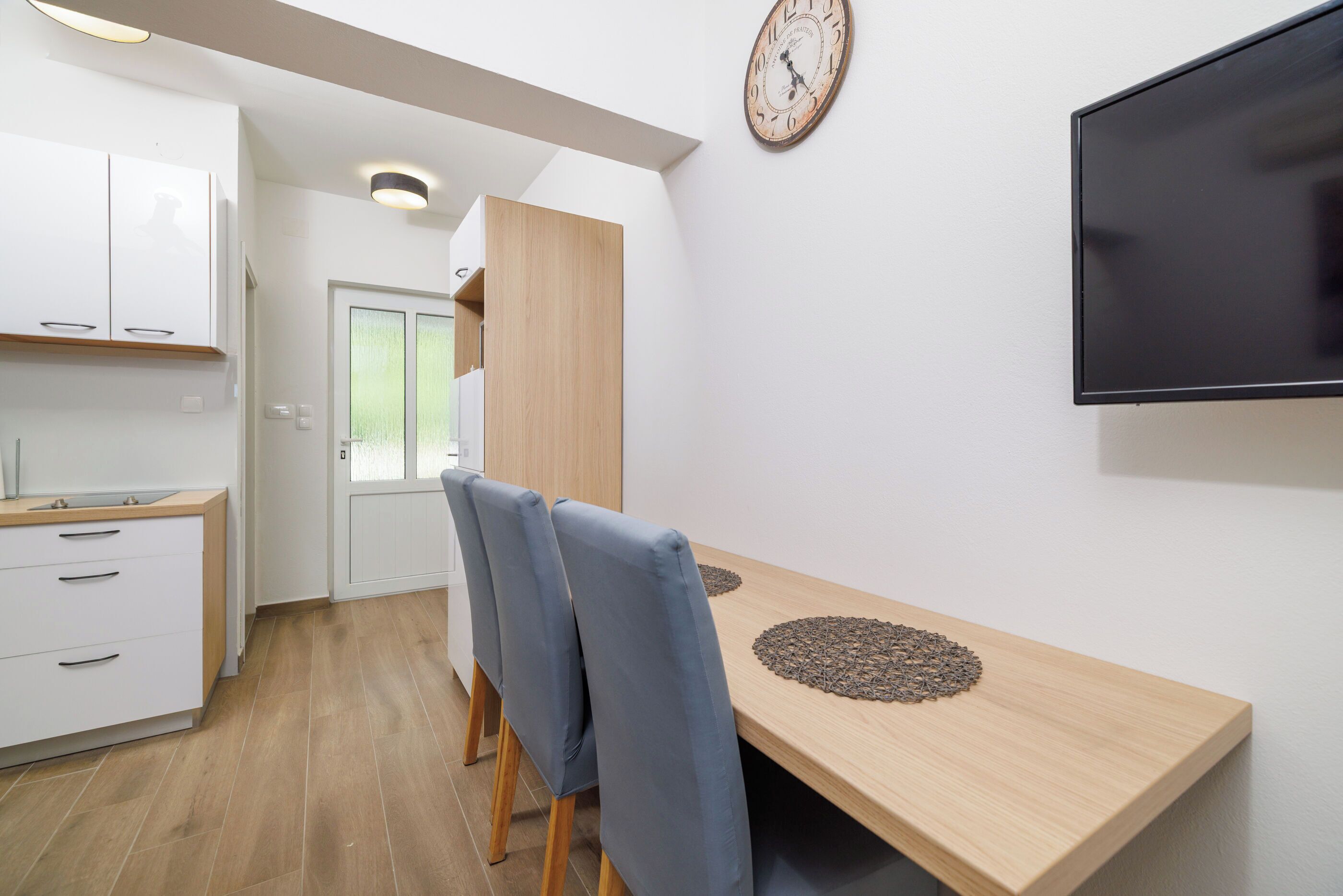 Apartamento (A3) | Cozinha privada | Geladeira, micro-ondas, cooktop, máquina de café expresso