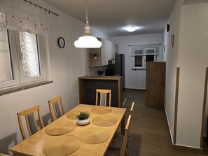 Apartment (A1) | Private kitchen | Fridge, microwave, oven, stovetop - Apartment Gianfranko (Opatija)