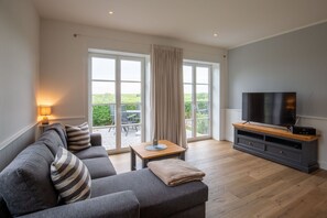 TV - Apartment 'Mama Sluuth' with Shared Terrace, Shared Garden and Wi-Fi (Pellworm)