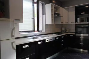 Apartment (A4) | Private kitchen | Fridge, microwave, oven, dishwasher