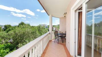 Apartamento (A2) | Restaurante al aire libre