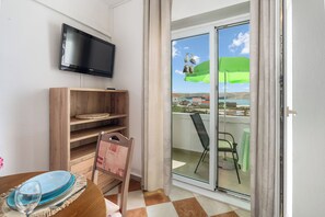 Apartment (A4) | Private kitchen | Fridge, stovetop, electric kettle, toaster