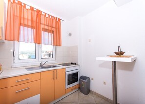 Apartment (A1) | Private kitchen - Apartment Slavica (Okrug)
