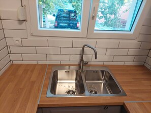 Apartment (A1) | Private kitchen | Fridge, oven, stovetop, espresso maker - Apartments Ana (Pag)