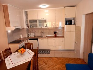 Apartment (A2) | Private kitchen | Fridge, oven, stovetop, espresso maker - Apartment Miki (Zadar)