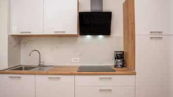 Apartment (A1) | Private kitchen | Fridge, stovetop, espresso maker, cookware/dishes/utensils