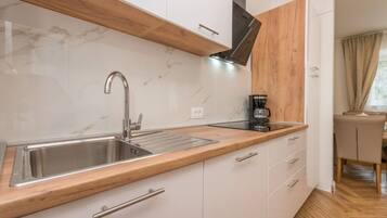 Apartment (A1) | Private kitchen | Fridge, stovetop, espresso maker, cookware/dishes/utensils