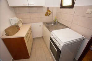 Apartment (A1) | Private kitchen | Fridge, microwave, oven, stovetop - Apartment Bozo (Split)