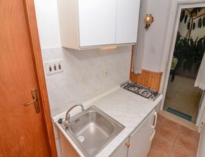 Apartment (A1) | Private kitchen | Fridge, microwave, stovetop, espresso maker