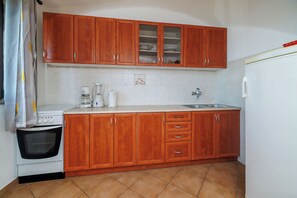 Estúdio (A3) | Cozinha privada | Geladeira, cooktop, máquina de café expresso
