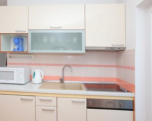 Apartment (A1) | Private kitchen | Fridge, microwave, stovetop, espresso maker - Apartments Jole (Jelsa)