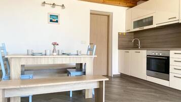 Apartment (A2) | Private kitchen | Fridge, oven, stovetop, dishwasher