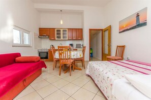 Apartment (A3) | Private kitchen | Fridge, oven, stovetop, electric kettle - Apartments Adriatic (Razanac)
