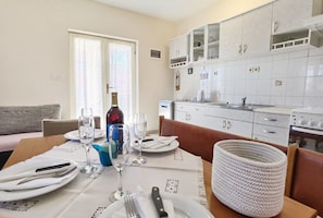 Apartment (A2) | Private kitchen | Fridge, microwave, oven, stovetop - Apartments Vinx (Rogoznica)