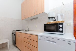 Apartment (A2) | Private kitchen | Fridge, microwave, oven, stovetop - Apartment Bosiljka (Marina)