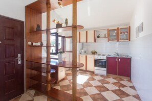 Apartment (A1) | Private kitchen | Fridge, microwave, oven, stovetop - Apartment Sanda (Solta)