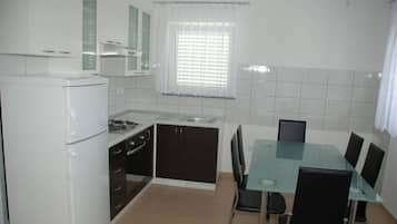Apartment (A4) | Private kitchen | Fridge, stovetop, espresso maker, electric kettle