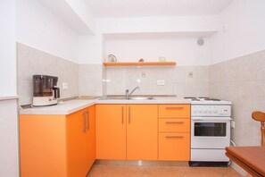 Apartment (A2) | Private kitchen | Fridge, oven, stovetop, espresso maker - Apartments Zana (Trogir)