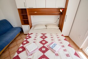 Tabla de planchar con plancha, cunas gratuitas y wifi gratis 