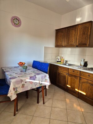 Apartment (A2) | Private kitchen | Fridge, microwave, stovetop, espresso maker - Apartments Josi (Sibenik)