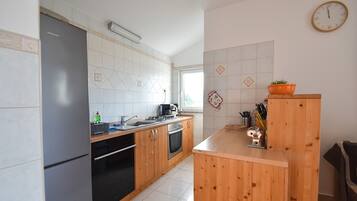 Apartment (A1) | Private kitchen | Fridge, stovetop, espresso maker, electric kettle