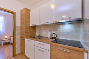 Apartment (A2) | Private kitchen | Fridge, oven, stovetop, espresso maker