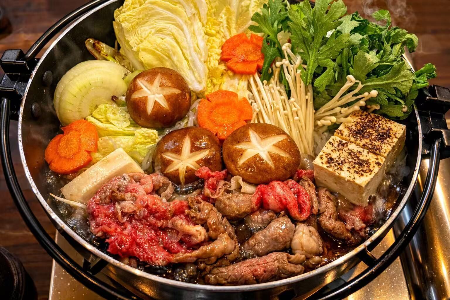 A hot pot with various ingredients like vegetables, tofu, and meat.