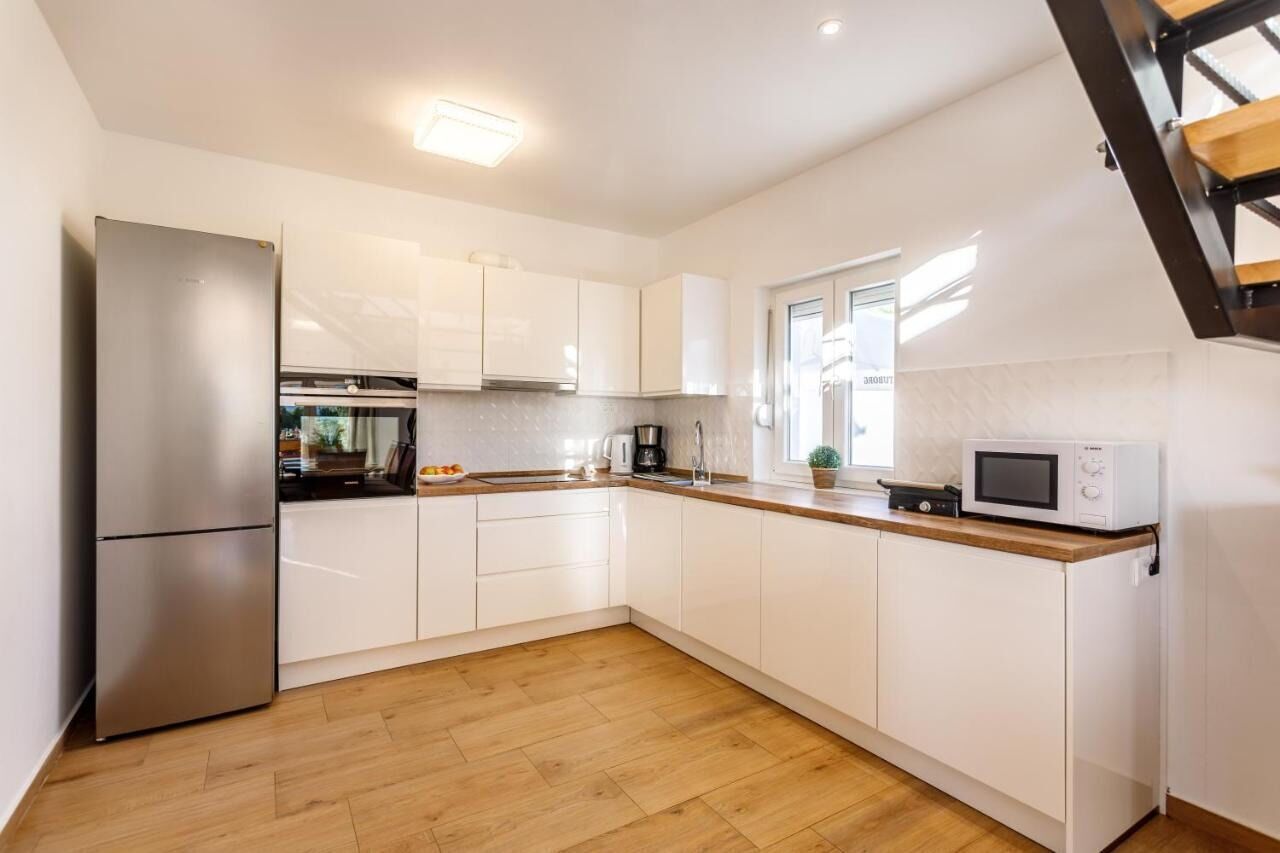 Casa | Cucina privata | Frigorifero, microonde, forno, piano cottura