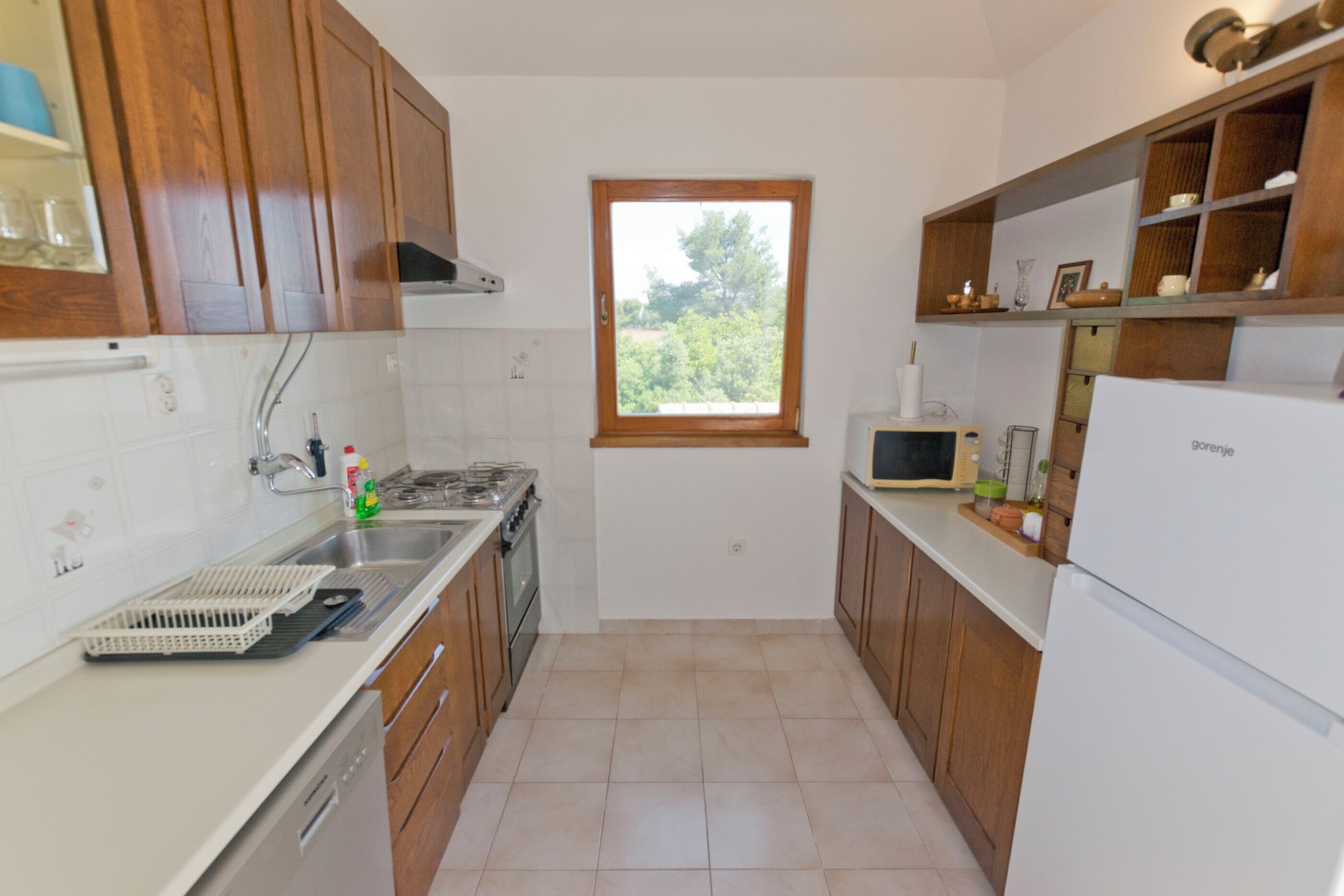 Apartment (A1) | Private kitchen | Fridge, microwave, oven, stovetop