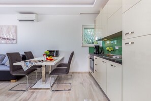 Apartment (A6) | Private kitchen | Fridge, oven, stovetop, dishwasher - Apartments Igor (Kostrena)