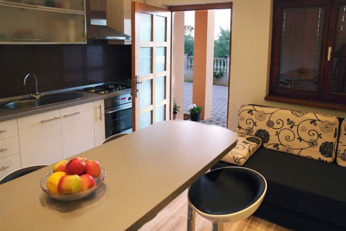 Apartment (A2) | Private kitchen | Fridge, microwave, oven, stovetop