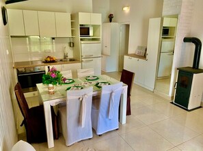 Apartment (A1) | Private kitchen | Fridge, oven, stovetop, espresso maker - Apartments Neve (Sibenik)