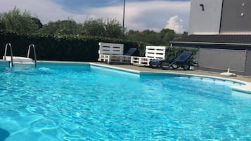 Outdoor pool, sun loungers