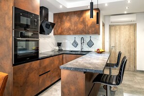 Apartment (A2) | Private kitchen | Fridge, microwave, oven, stovetop - Apartments Andrea (Sibenik)
