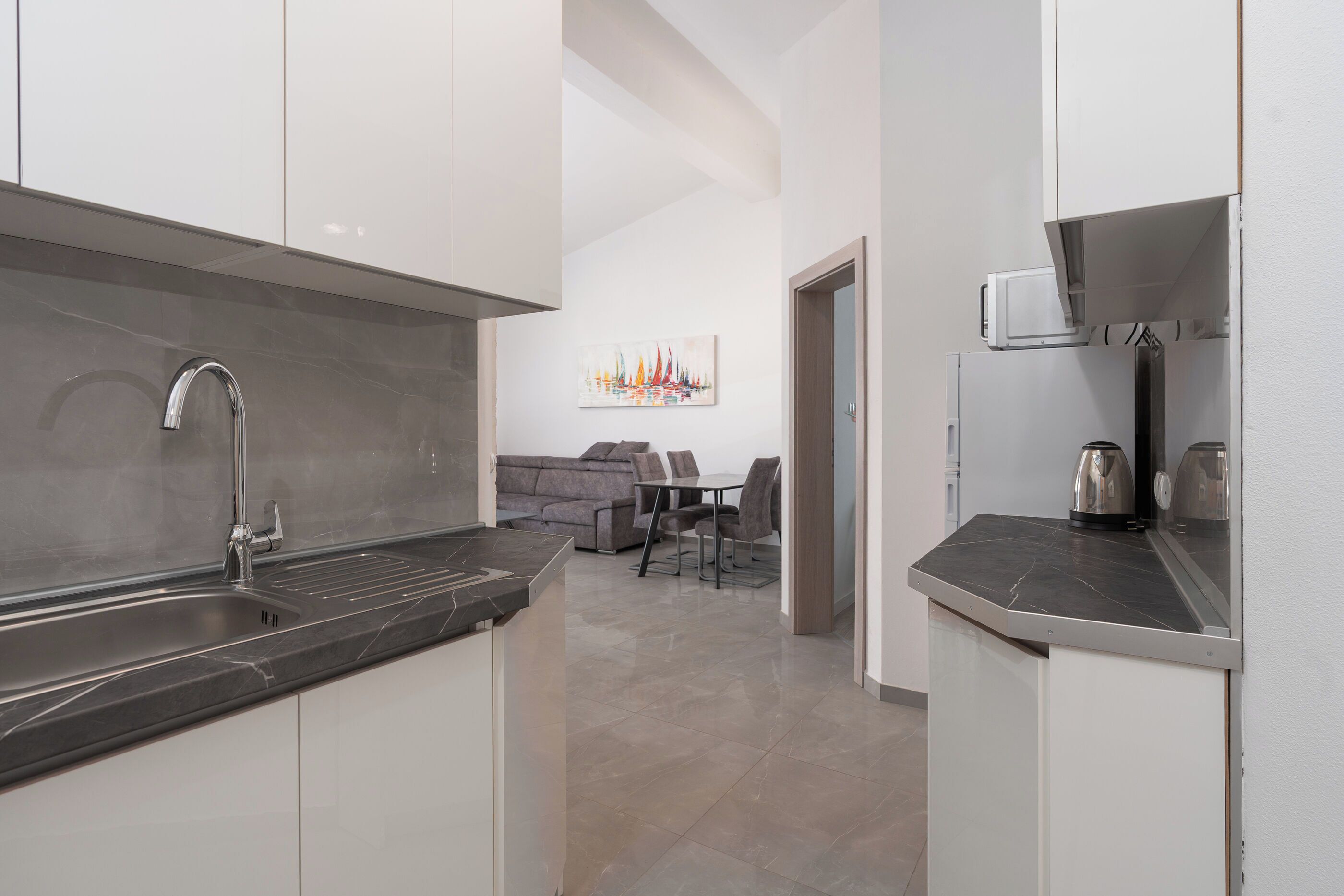 Apartment (A2) | Private kitchen | Microwave, stovetop, electric kettle