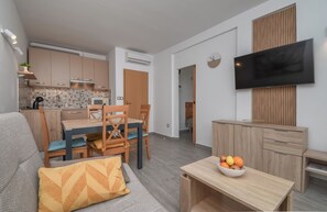 Apartment (A1) | Wohnzimmer | Smart-TV, Videospielkonsole