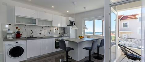 Apartment (A2) | Private kitchen | Fridge, microwave, oven, stovetop