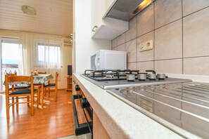 Apartment (A2) | Private kitchen | Fridge, oven, stovetop, espresso maker - Apartments Ivancic (Seget)