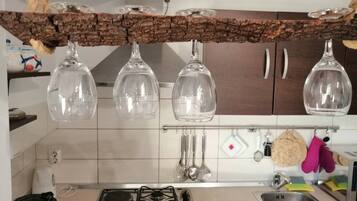 Apartment (A1) | Private kitchen | Fridge, microwave, oven, stovetop