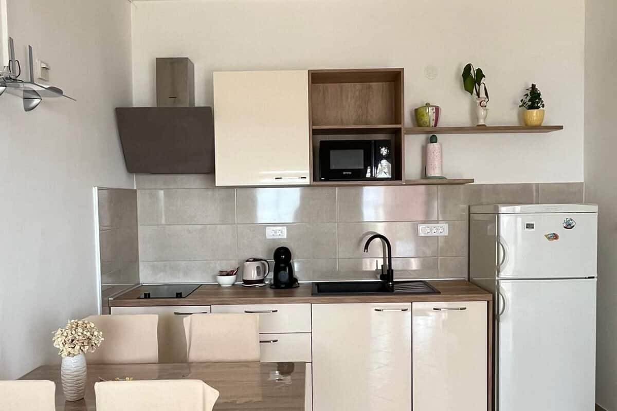 Appartement (A1) | Cuisine privée | Réfrigérateur, surface de cuisson, lave-vaisselle, cafétière à espresso