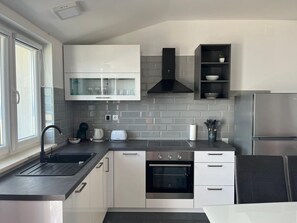Apartment (A3) | Private kitchen | Fridge, stovetop, dishwasher, espresso maker - Apartments Dobrila (Jelsa)