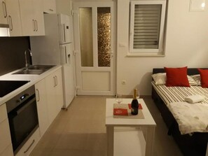 Studio (A3) | Private kitchen | Fridge, stovetop, cookware/dishes/utensils - Apartments Paradiso (Omis)
